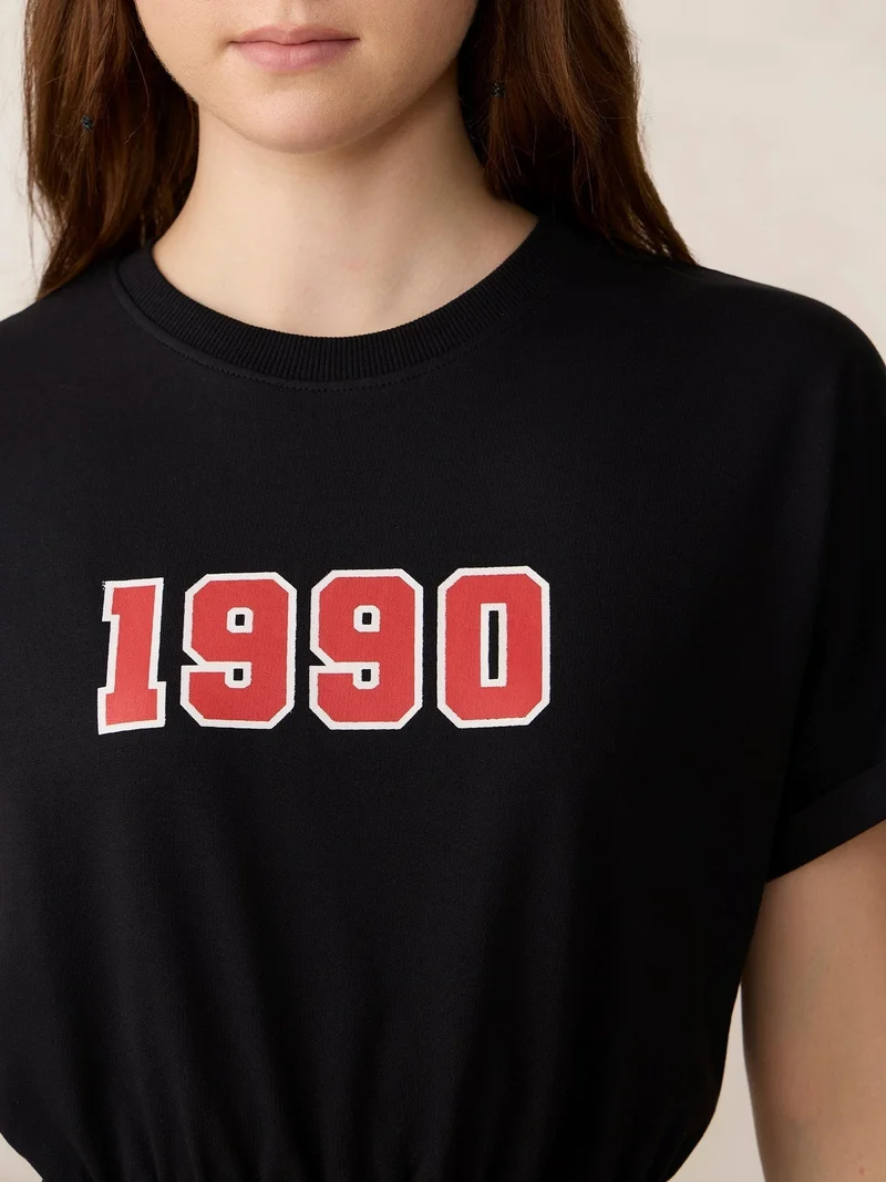 أوجيدر بلوزة قصيرة سوداء واسعة بخصر مطاطي